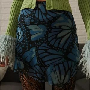 uo asymmetric mesh mini butterfly skirt